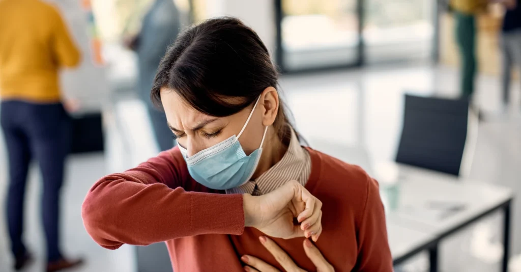 businesswoman face mask coughing