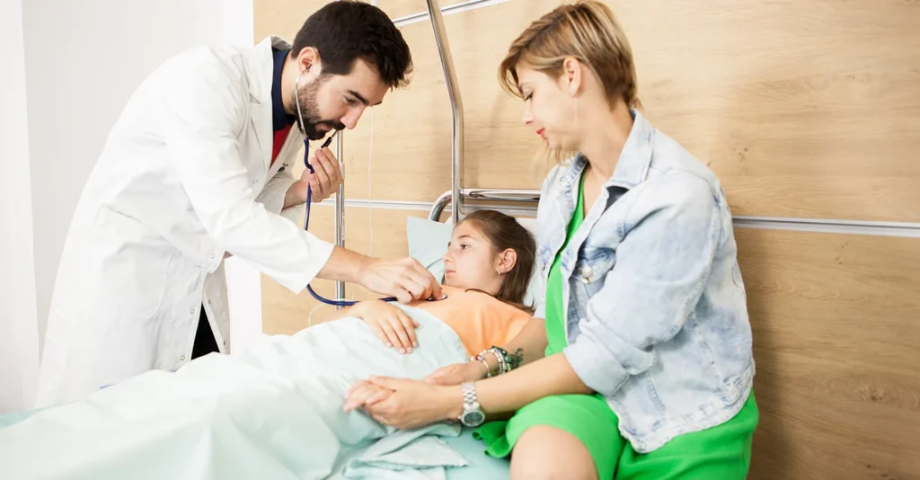 doctor checking patient