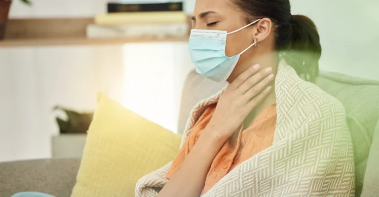 woman_sore_throat_face_mask